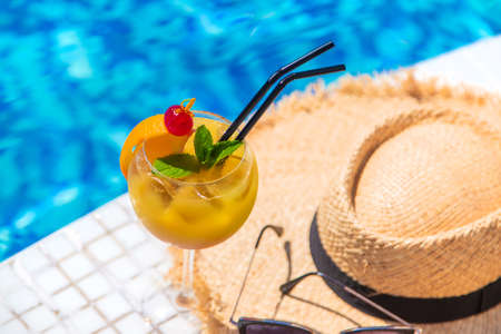 Nice cocktail by the pool. Selective focus. Drink.の写真素材