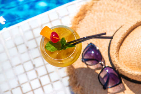 Nice cocktail by the pool. Selective focus. Drink.の写真素材