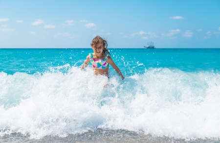 Child girl at the sea. Selective focus. Baby.の写真素材