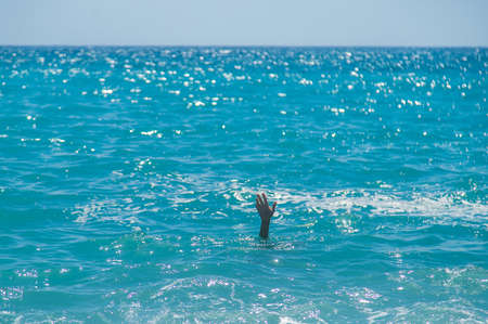 The child is drowning in the sea. Selective focus. Kid,の写真素材