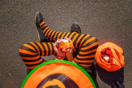 Halloween holiday, child girl in costume. Selective focus. Kid.の写真素材