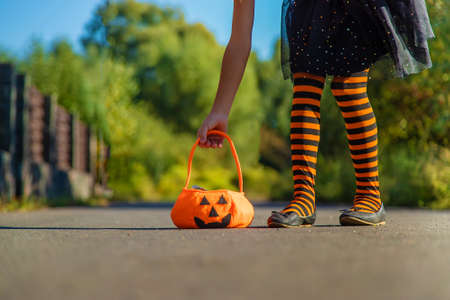 Halloween holiday, child girl in costume. Selective focus. Kid.の写真素材