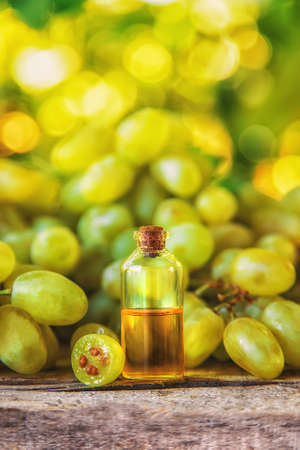 Grape seed oil in a bottle. Selective focus. Nature.の写真素材