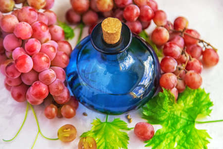 Grape seed oil in a bottle. Selective focus. Nature.の写真素材