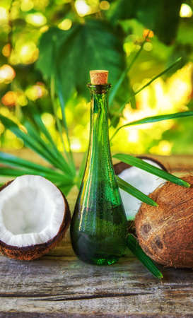 Natural coconut oil in a bottle. Selective focus Nature.の写真素材