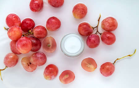 Cream with grape seed extract. Selective focus. Nature.の写真素材