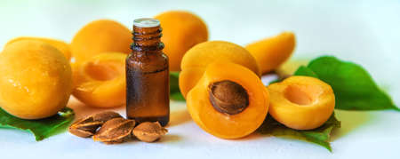 Apricot kernel oil in a bottle. Selective focus. Food.の写真素材