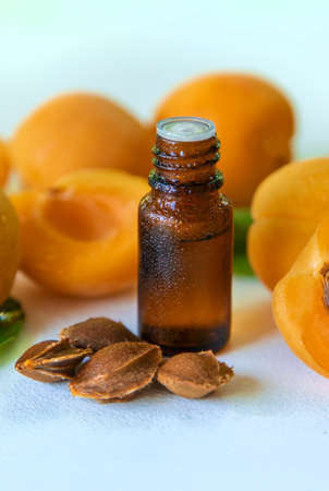 Apricot kernel oil in a bottle. Selective focus. Food.の写真素材
