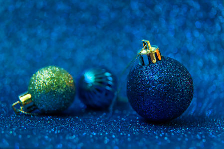 Christmas tree decorations on a shiny background. Vibratory focus. Holiday.の写真素材
