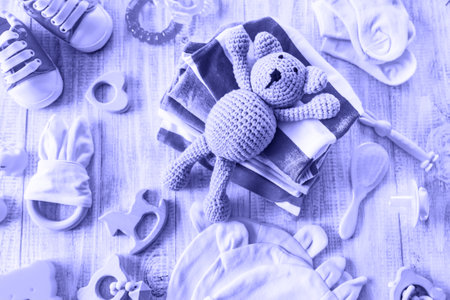 Baby clothes and accessories for the newborn. very peri, Color of the year, 2022, blue, purple, Selective focus. nature.の写真素材