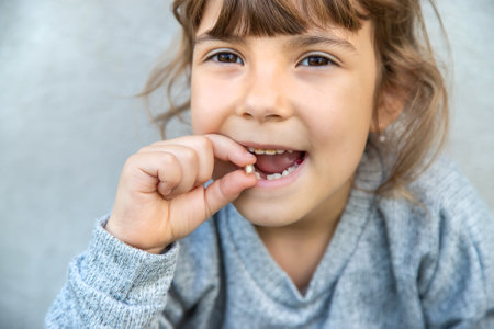The child tooth fell out. Selective focus.
