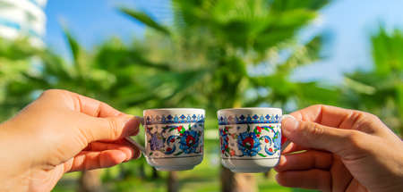 cups with Turkish coffee in hands. Selective focus. Drink.の写真素材