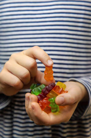 Jelly vitamins candy teddy bears isolate on a white background. Selective focus. Child.の写真素材