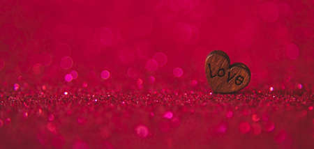 Shiny background with valentine heart. Selective focus. Love.の写真素材