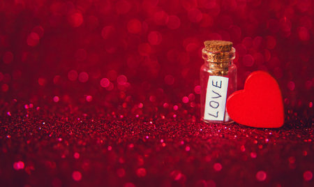 Shiny background with valentine heart. Selective focus. Love.の写真素材