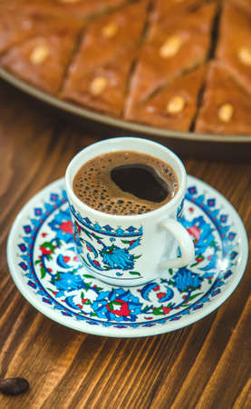 Baklava on the table and Turkish coffee. Selective focus.の写真素材