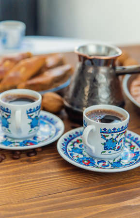 Baklava on the table and Turkish coffee. Selective focus.の写真素材