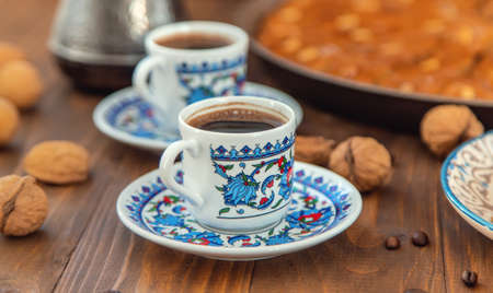 Baklava on the table and Turkish coffee. Selective focus.の写真素材
