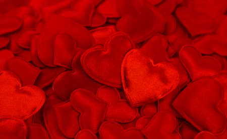 Beautiful red background with hearts. Valentines Day. Selective focus.