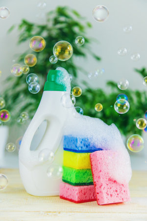 Eco household cleaner and sponge with foam. selective focus. Nature.の写真素材