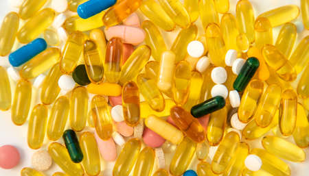 Supplements and vitamins on a white background. selective focus. medicine.