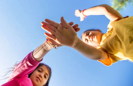 Children walk together holding hands. selective focus. kids.