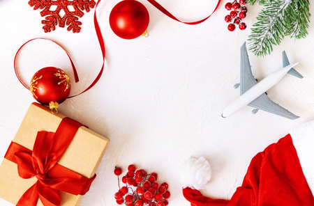 Christmas background with airplane, travel. Selective focus.
