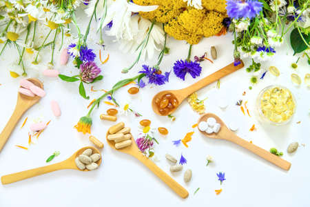 Homeopathy and dietary supplements from medicinal herbs. Selective focus.の写真素材