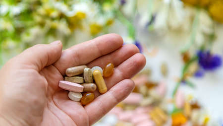 Homeopathy and dietary supplements from medicinal herbs. Selective focus.の写真素材