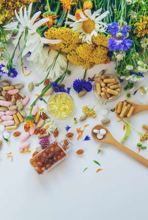 Homeopathy and dietary supplements from medicinal herbs. Selective focus.の写真素材