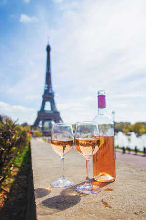 Wine in a glass near the eiffel tower. selective focus. Nature.の写真素材