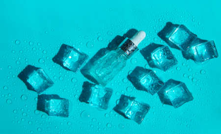 Ice cubes on a blue background. selective focus. food.