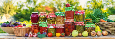 Jars with preserved vegetables for the winter. selective focus. food.の写真素材