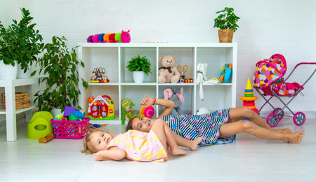 Children play together in the room. selective focus. kids,の写真素材