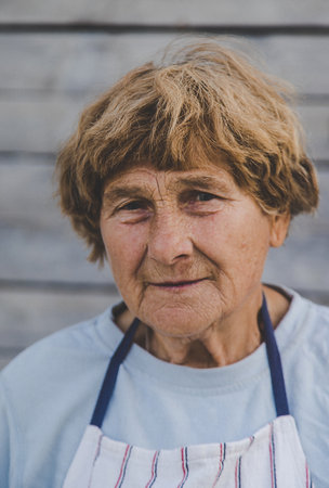 Portrait of an old woman. Selective focus.の写真素材