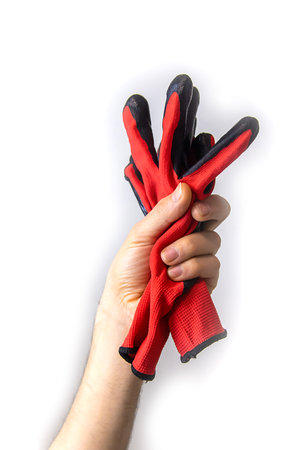 Electrician's gloves in hand isolate. selective focus. people.