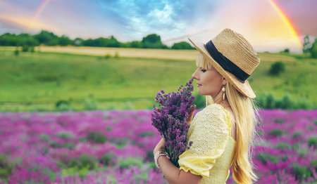 beautiful woman in lavender field. selective focus. Nature.の写真素材