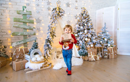 Child in his room decor christmas. selective focus. kid.の写真素材
