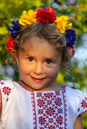 Child Ukrainian in a wreath. selective focus. Nature.の写真素材