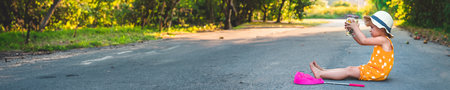 A child catches a butterfly in nature. selective focus. kid.の写真素材