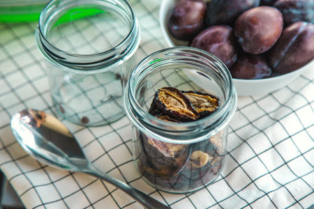 Plums dried in a dehydrator. Selective focus.の写真素材