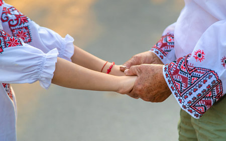 Ukrainian grandmother and granddaughter in vyshyvanka. selective focus.の写真素材
