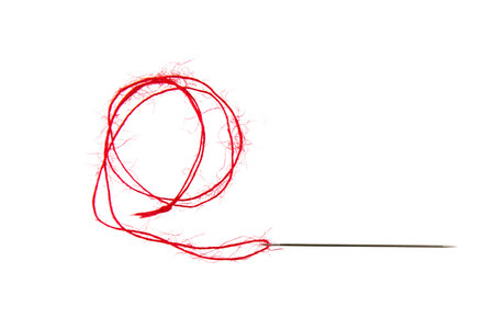 Threads on a white background. Selective focus.の写真素材