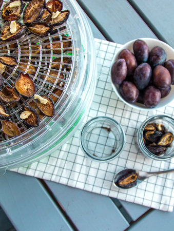 Plums dried in a dehydrator. Selective focus.