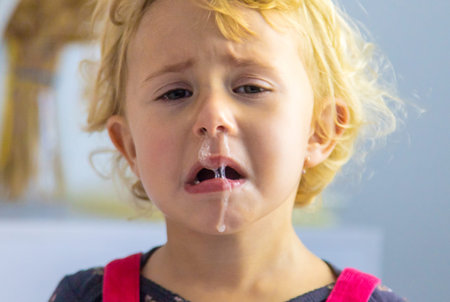 The child is crying. selective focus.の写真素材