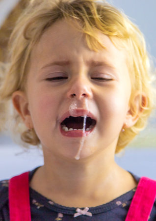 The child is crying. selective focus.の写真素材