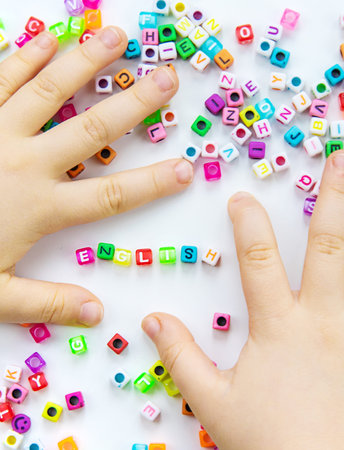 Child cubes and the word English. Selective focus.の写真素材