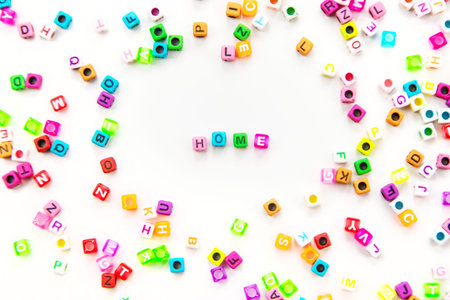 Child cubes and the word home. Selective focus.