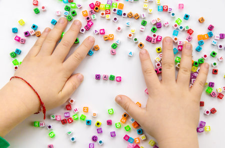 Child cubes and word game. Selective focus.の写真素材