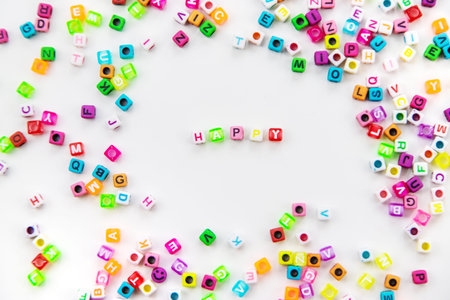 Child cubes and the word happy. Selective focus.